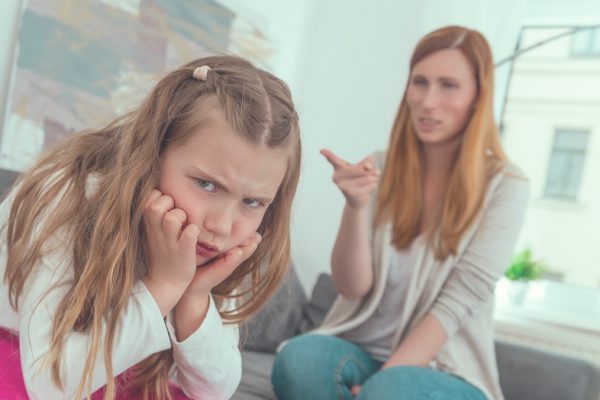 ten ways to help control aggression in kids - mum telling angry daughter off