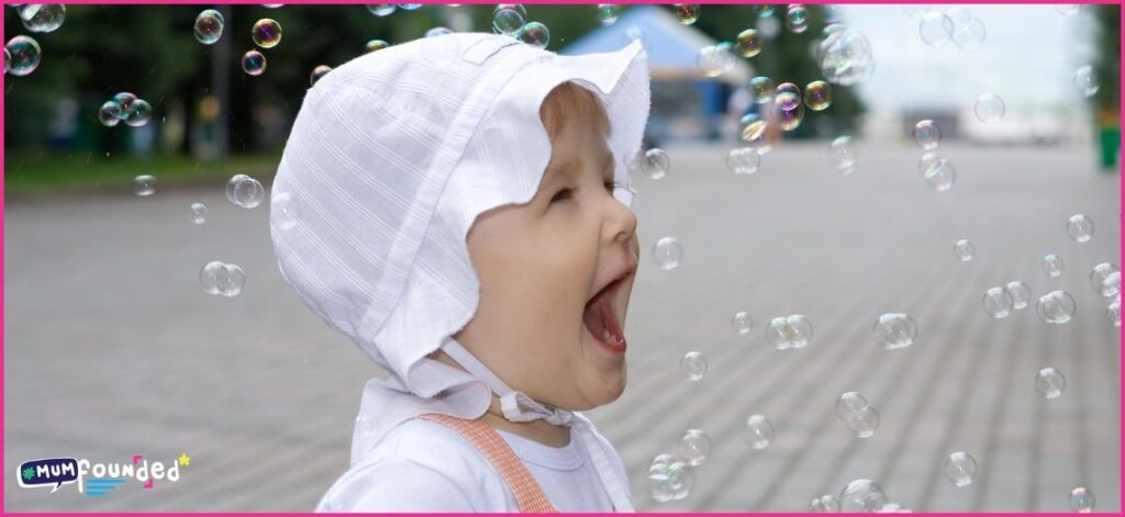 Summer Sensory Play Ideas for babies - baby with bubbles
