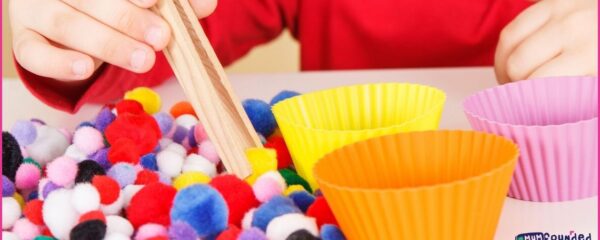 mess free sensory play ideas - sorting coloured pom poms
