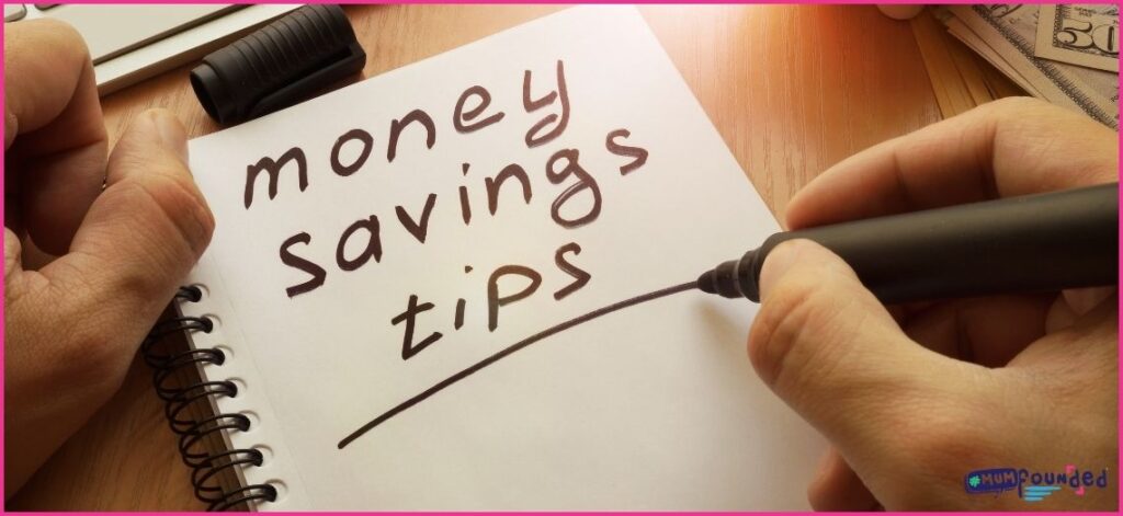 someone writing money saving tips for parents in a notebook